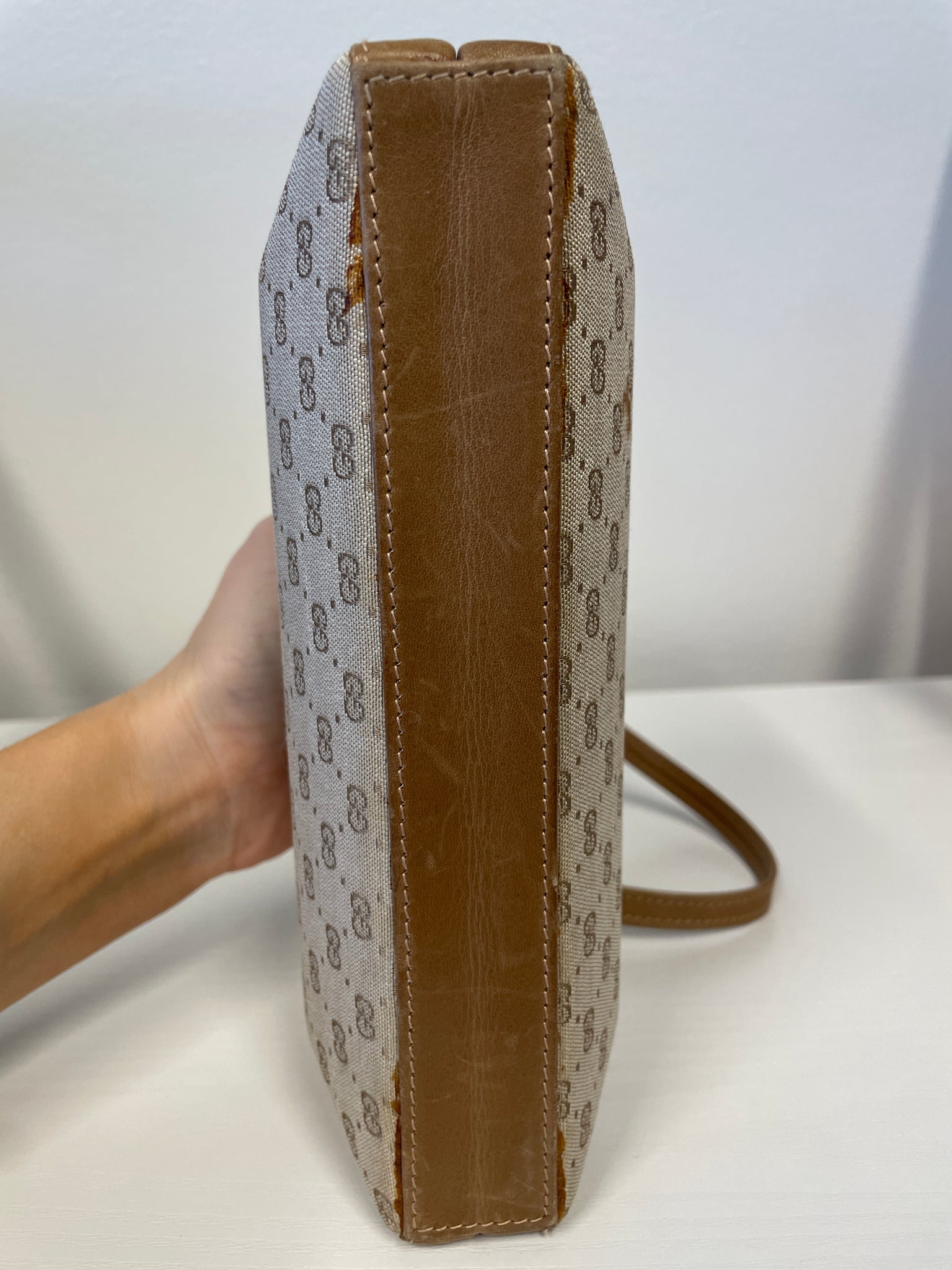 Gucci Vintage Canvas Monogram Box Clutch with gold hardware and leather trim.