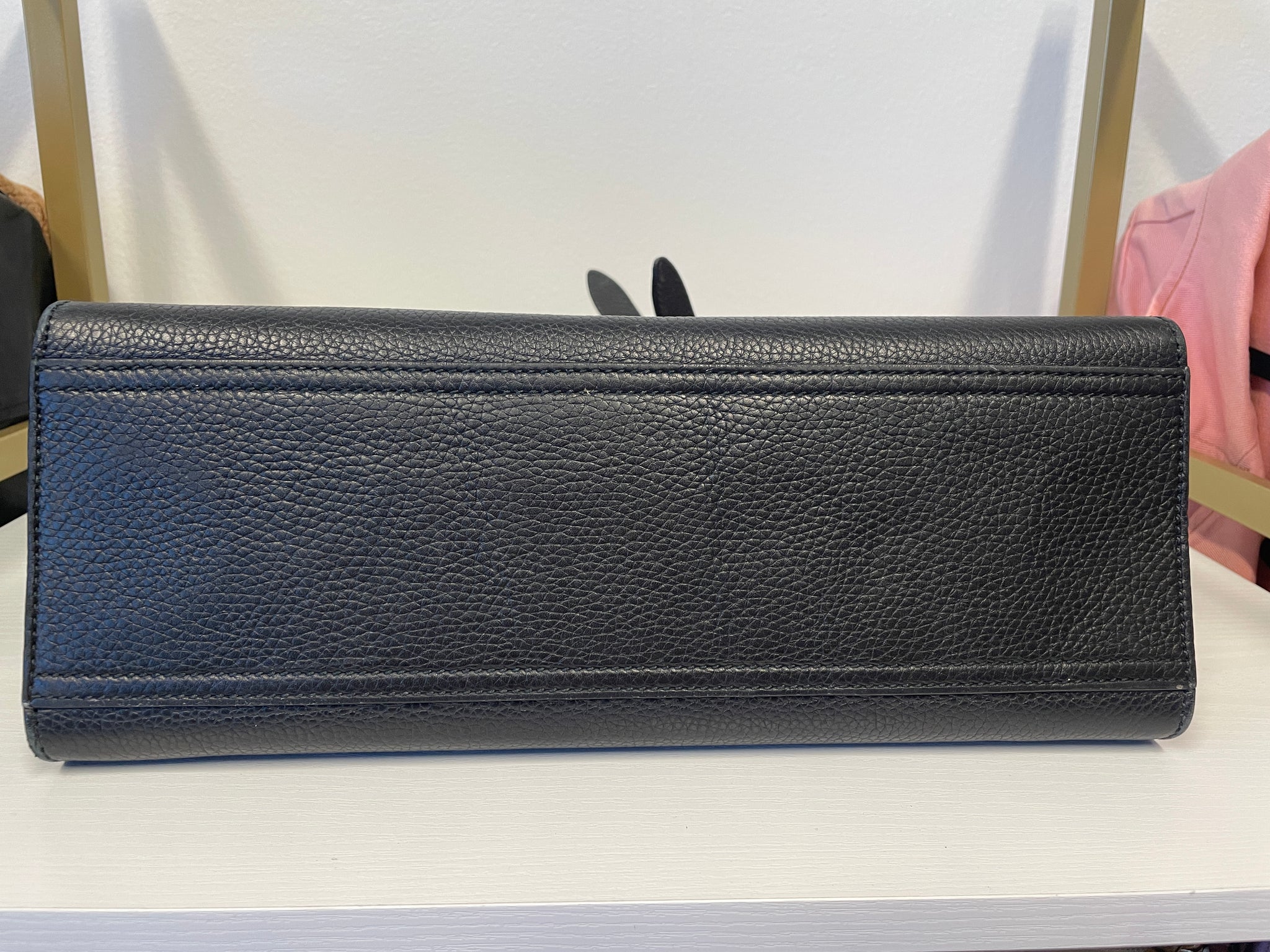 Gucci GG Marmont Animalier Leather Handbag in black with gold GG hardware.