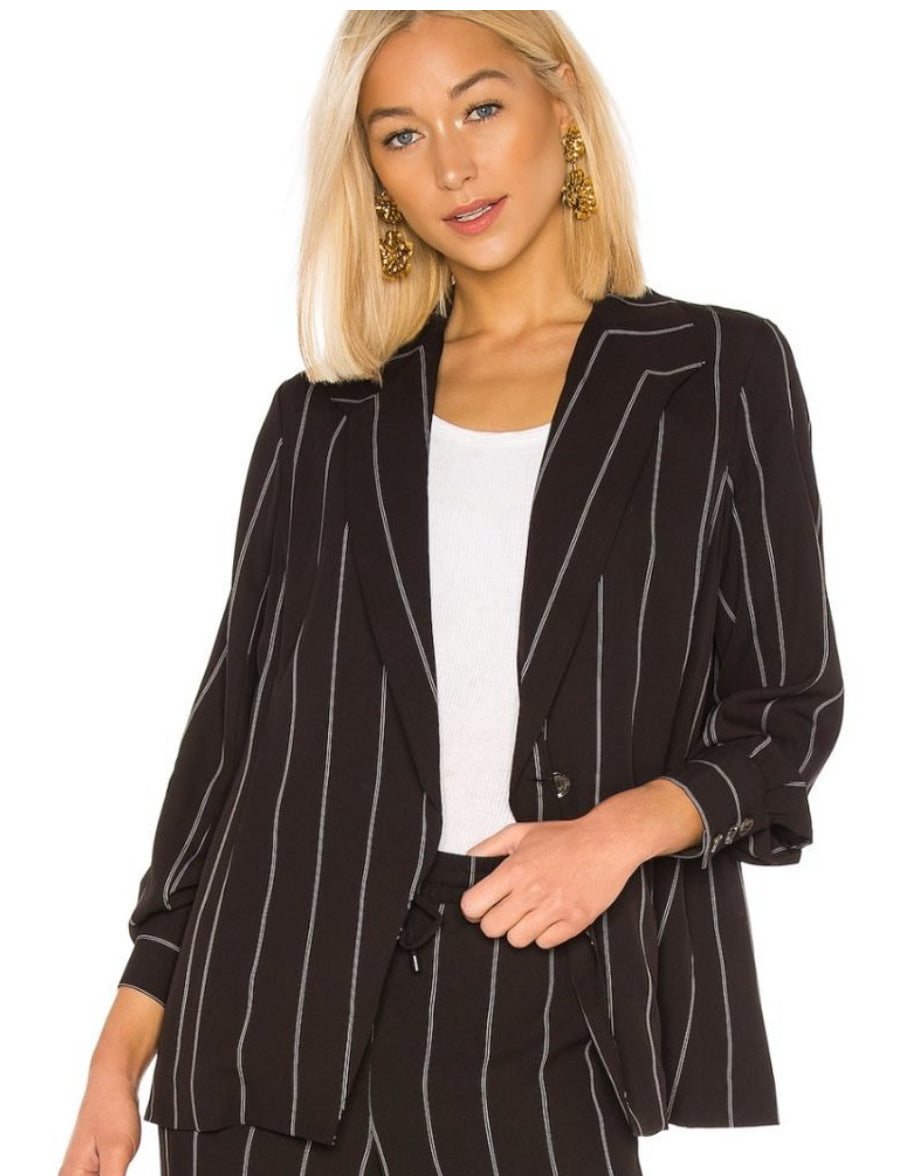 Anine Bing Pinstripe Blazer Top in black with white stripes, front view.