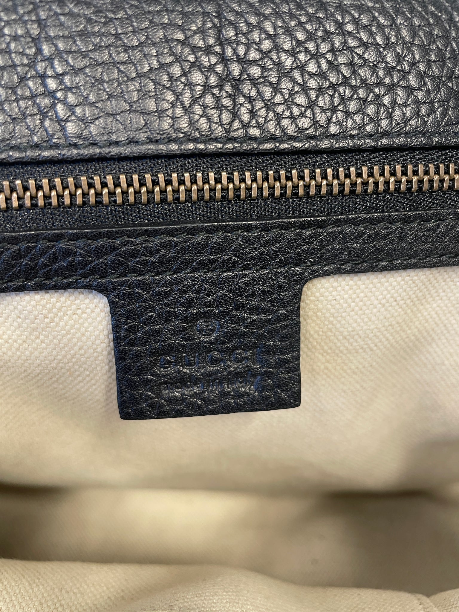 Gucci serial tag and authenticity details inside the Marmont bag.