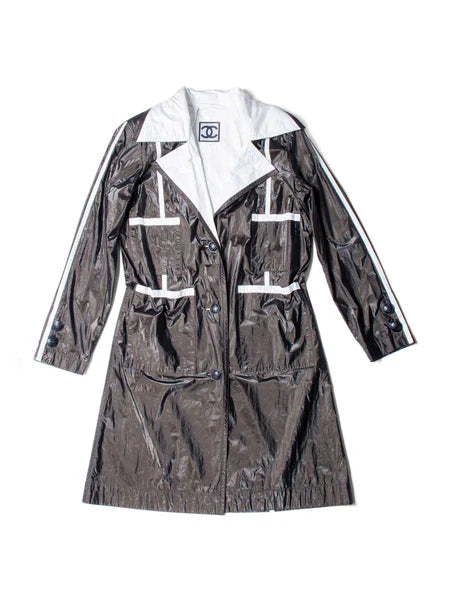 Front view of CHANEL CC Logo Rain Coat with CC logos and white trim.