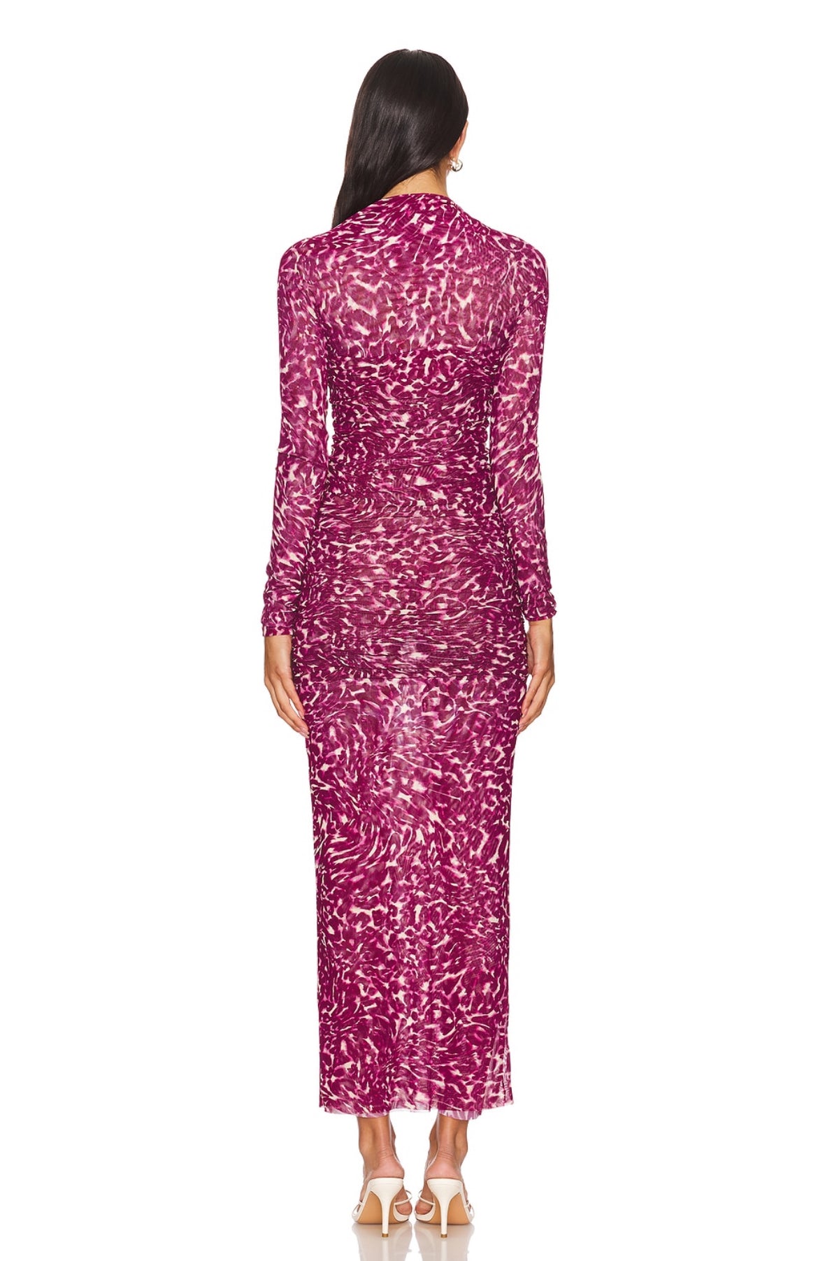 Back view showing long sleeve design and fitted silhouette.