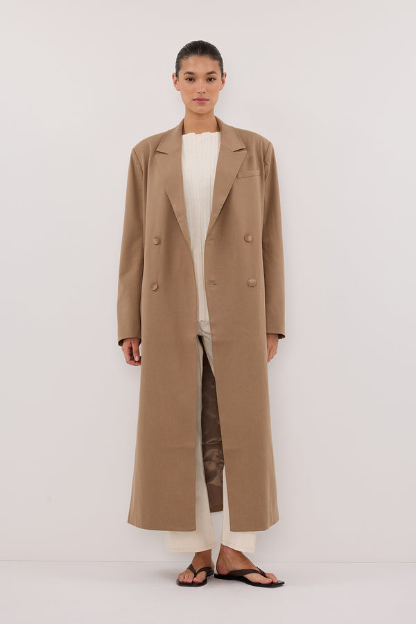 Model wearing Dissh Celina tan wool blend longline coat