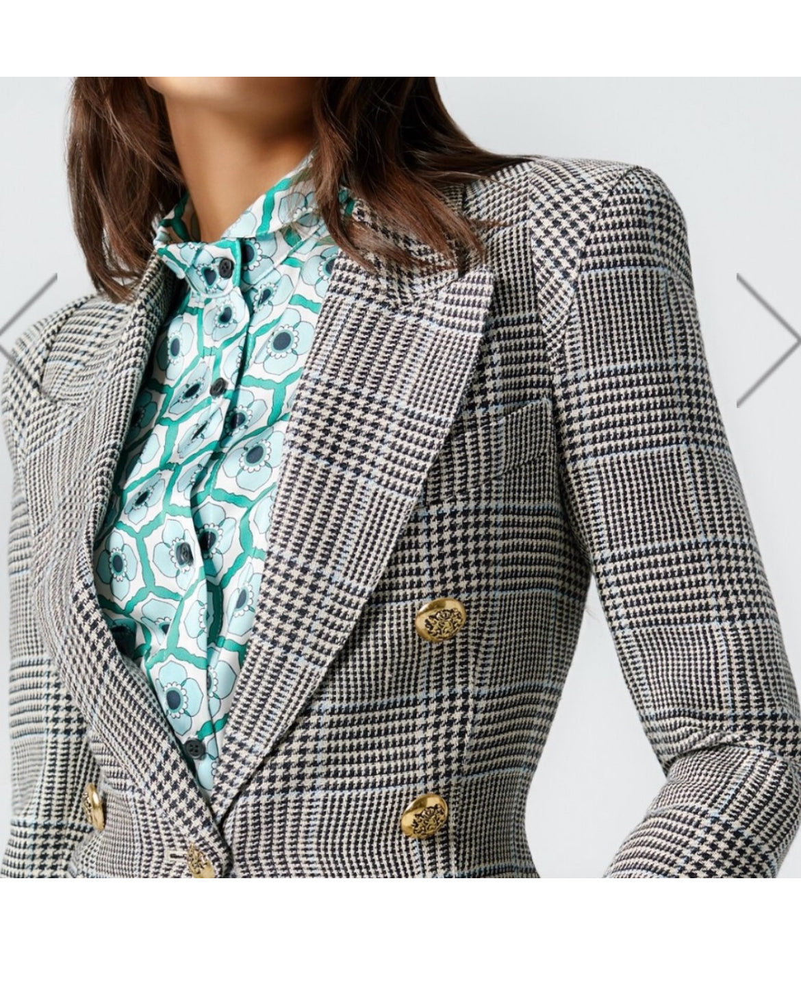 Side profile showing Smythe Pagoda Blazer’s structured shoulders.
