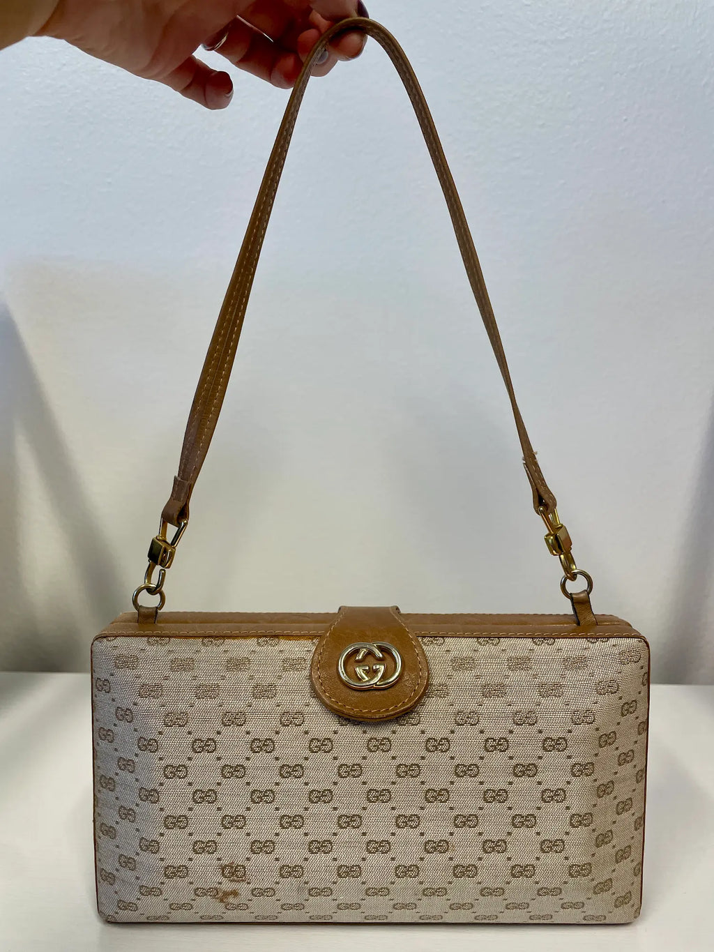 Gucci Vintage Canvas Monogram Box Clutch with gold hardware and leather trim.