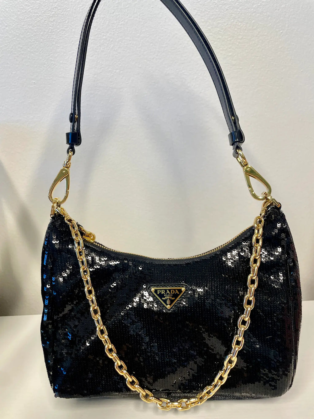 Prada Re-Nylon Sequined Mini Bag in black with chain-link handle.