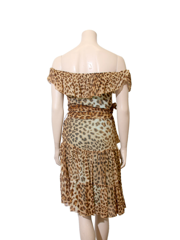 Back view of leopard print silk mini dress.