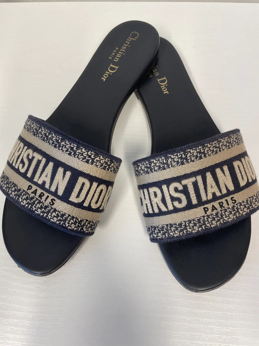 Top view of Dior Dway Slides in blue embroidered canvas.
