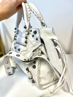 Side profile of Balenciaga Neo Cagole Small Handbag with braided handles