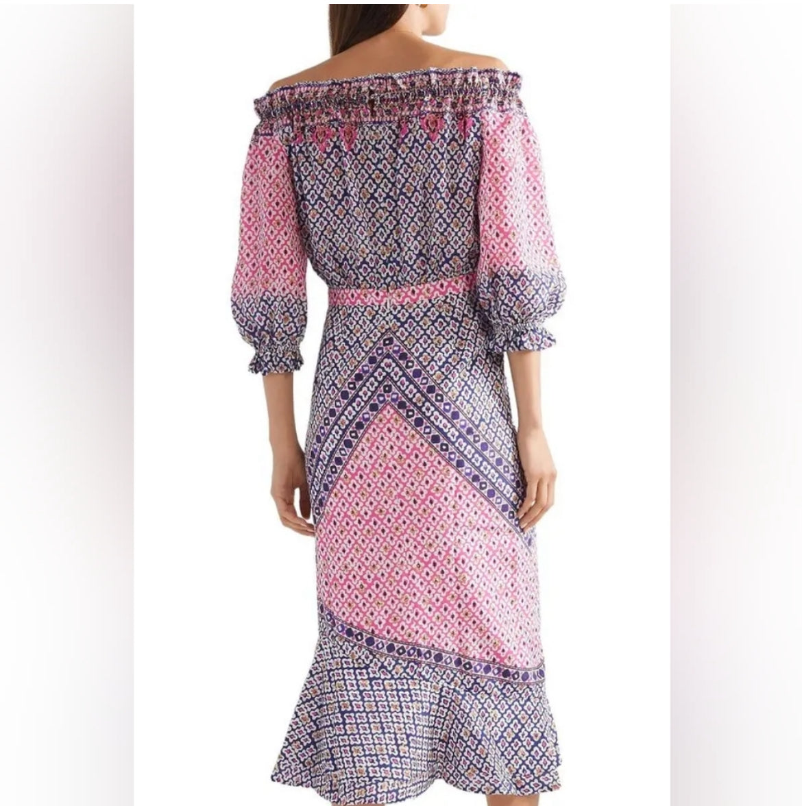 Back view of Saloni off-shoulder midi dress showing fluted hem and silhouette.