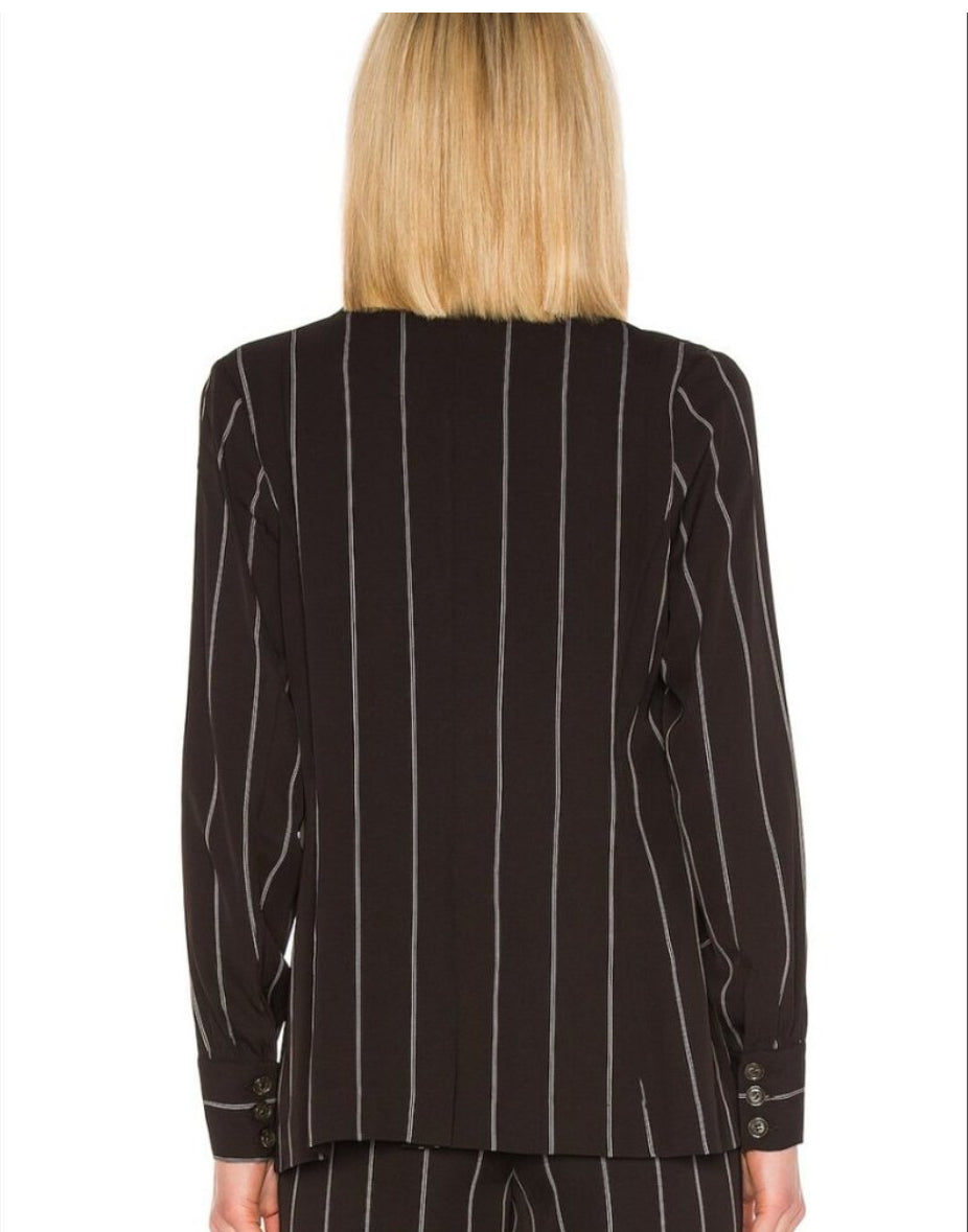 Back view of Anine Bing black pinstripe blazer showing relaxed fit.